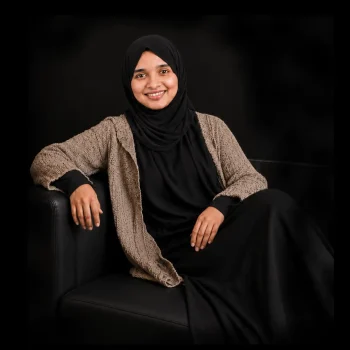 Best digital marketing expert in Malappuram sitting in a sofa